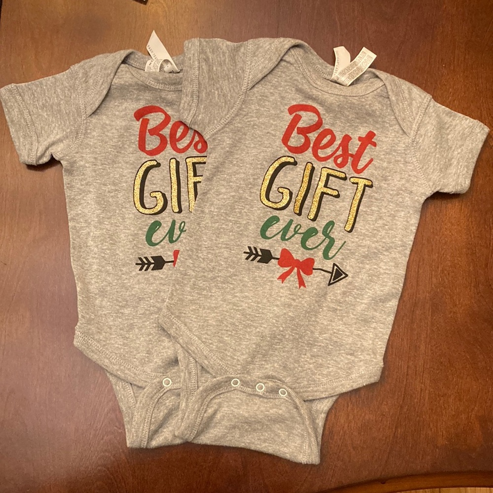TWO short sleeve onesies. Some stitching issues on one. New with tags.